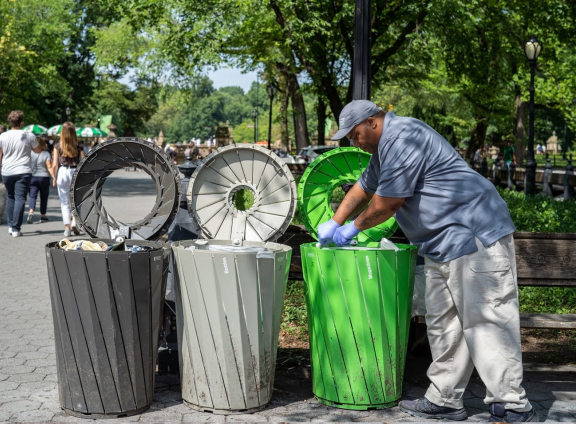 Central Park Trash Cans and Staff