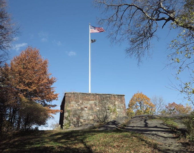 Photo of the Blockhouse against a blue sky.
