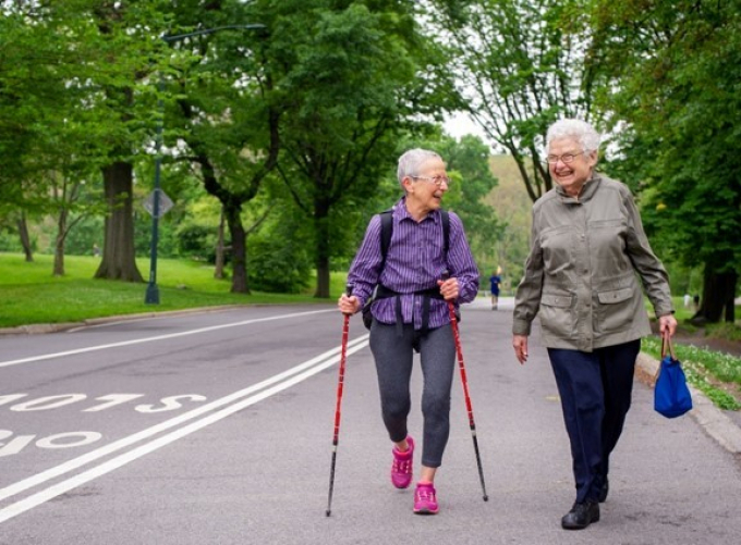 Roberta and Susan walk the West Drive