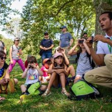 A Conservancy guide shows kids how to use binoculars